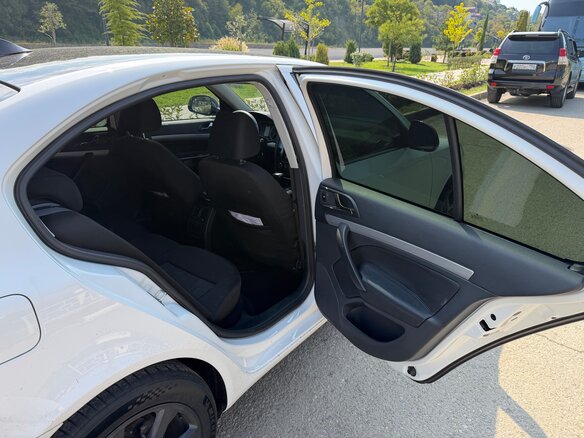 2012 Skoda Octavia II (A5) Рестайлинг, белый, 1390000 рублей - вид 11