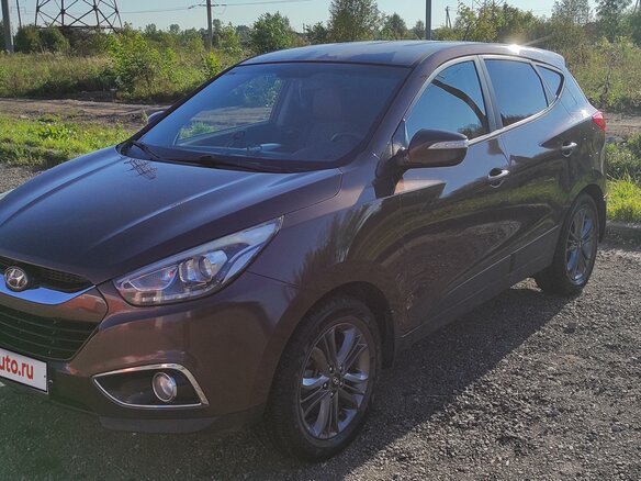 2014 Hyundai ix35 I Рестайлинг, коричневый, 1500000 рублей - вид 1