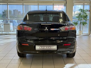 2011 Mitsubishi Lancer X Рестайлинг, чёрный, 650000 рублей, вид 4