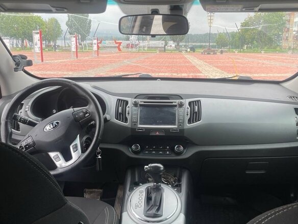 2015 Kia Sportage III Рестайлинг, коричневый, 1600000 рублей - вид 5