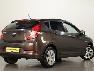 2015 Hyundai Solaris I Рестайлинг, коричневый, 839000 рублей, вид 4