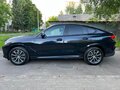 2022 BMW X6 40d III (G06), чёрный, 6550000 рублей - вид 6