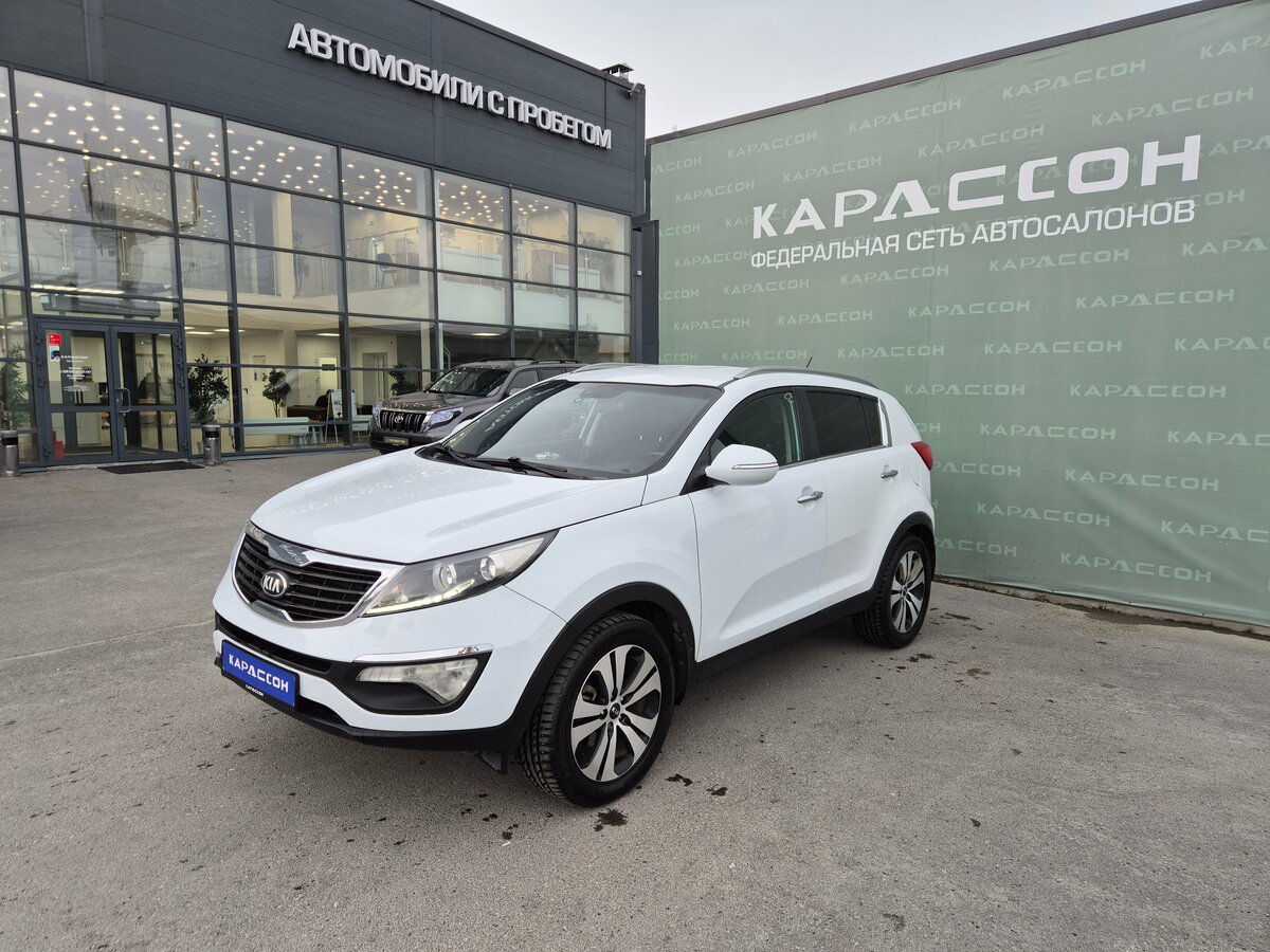 Открыть фотографии: Kia Sportage III