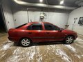 1999 Mitsubishi Carisma I Рестайлинг, пурпурный - вид 2