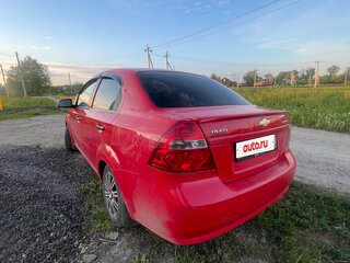 2010 Chevrolet Aveo I Рестайлинг, красный, 330000 рублей, вид 5