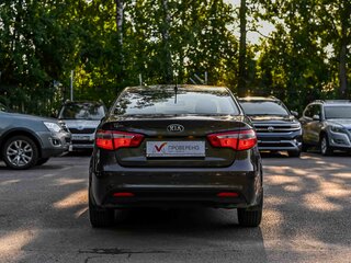 2014 Kia Rio 6-speed III, коричневый, 811000 рублей, вид 3