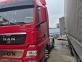2011 MAN TGX, красный, 2500000 рублей - вид 6