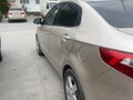 2012 Kia Rio 4-speed III, бежевый, 930000 рублей - вид 1