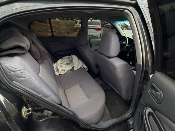 2004 Nissan Almera II (N16) Рестайлинг, чёрный - вид 11