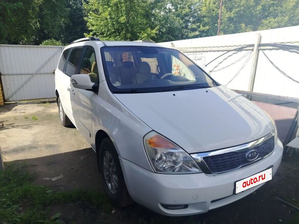 2010 Kia Carnival Grand II, белый, 1490000 рублей