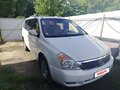 2010 Kia Carnival Grand II, белый, 1490000 рублей