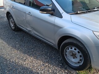 2010 Ford Focus II Рестайлинг, серебристый, 440000 рублей, вид 2