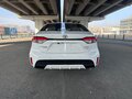 2025 Toyota Corolla Sporty XII (E210) Рестайлинг, белый - вид 3