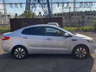 2011 Kia Rio 4-speed III, серебристый, 900000 рублей, вид 4