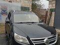 2011 Volkswagen Tiguan I, чёрный, 850000 рублей - вид 3