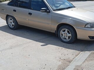 2012 Daewoo Nexia I Рестайлинг, бежевый, 370000 рублей, вид 1