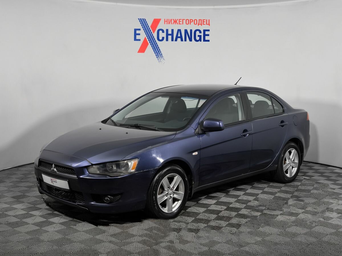 Открыть фотографии: Mitsubishi Lancer X