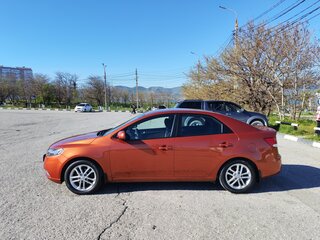 2011 Kia Cerato 6-speed II, оранжевый, 850000 рублей, вид 4