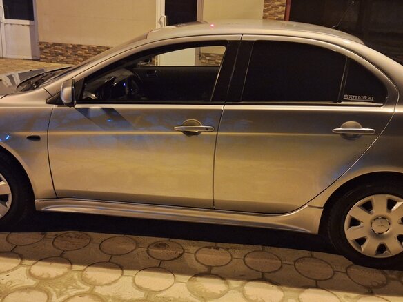2007 Mitsubishi Lancer X, серебристый, 650000 рублей - вид 5