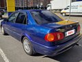 1999 Toyota Corolla VIII (E110), синий - вид 2