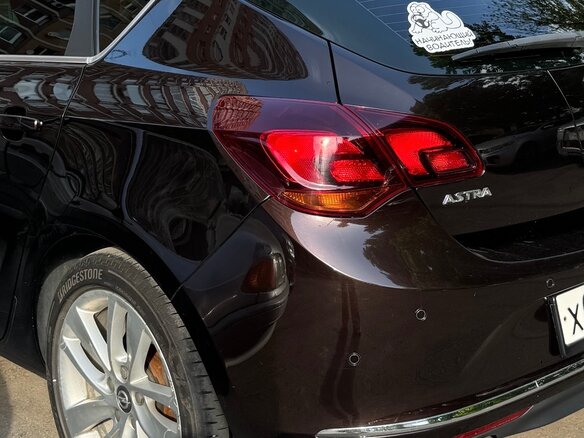 2014 Opel Astra J Рестайлинг, коричневый, 1360000 рублей - вид 6