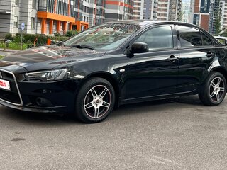 2012 Mitsubishi Lancer X Рестайлинг, чёрный, 700000 рублей, вид 1
