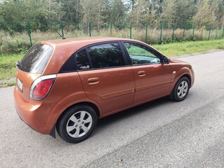 2011 Kia Rio II Рестайлинг, оранжевый, 600000 рублей, вид 4