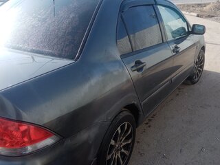 2006 Mitsubishi Lancer IX Рестайлинг, серый, 160000 рублей, вид 4