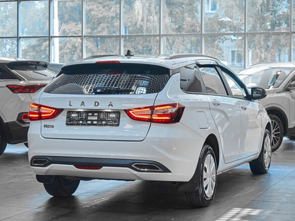 2024 Lada (ВАЗ) Vesta SW I Рестайлинг (NG), белый, 1149000 рублей - вид 5