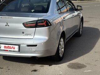 2011 Mitsubishi Lancer X Рестайлинг, серебристый, 555000 рублей, вид 4