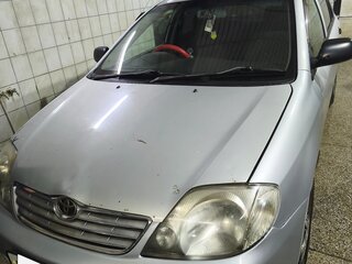 2002 Toyota Corolla IX (E120, E130), серый, 450000 рублей, вид 1
