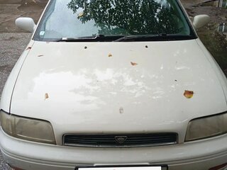 1993 Nissan Bluebird X (U13), белый, 95000 рублей, вид 1