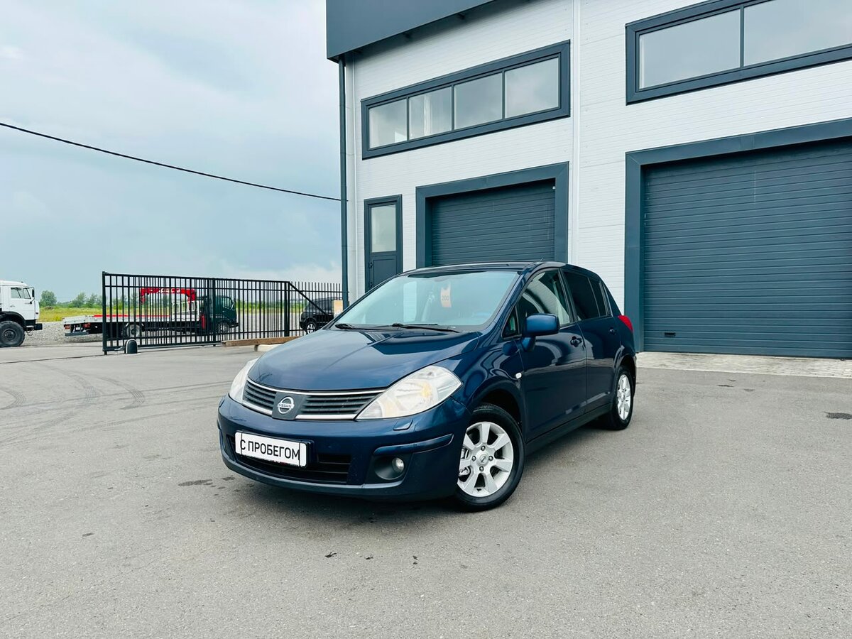 Открыть фотографии: Nissan Tiida I