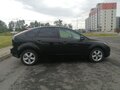 2009 Ford Focus II Рестайлинг, чёрный - вид 3
