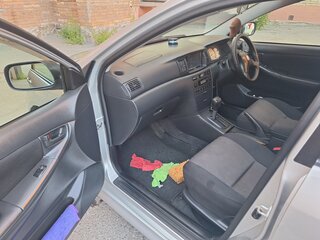 2001 Toyota Corolla Runx IX (E120, E130), серый, 595000 рублей, вид 5