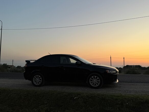 2012 Mitsubishi Lancer X Рестайлинг, чёрный, 750000 рублей - вид 5