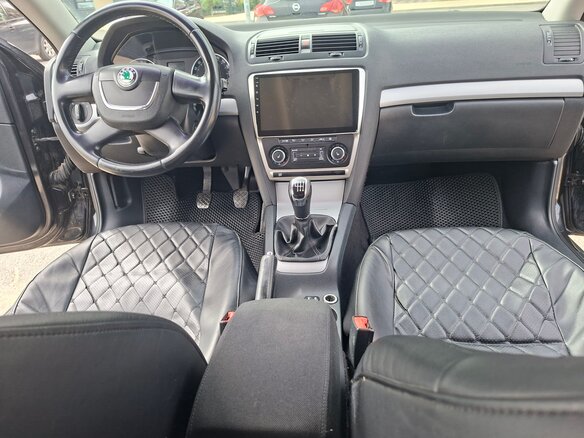 2012 Skoda Octavia II (A5) Рестайлинг, чёрный, 780000 рублей - вид 7