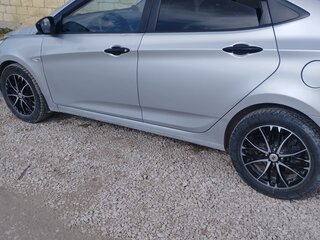 2011 Hyundai Solaris I, серебристый, 730000 рублей, вид 3