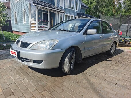 2009 Mitsubishi Lancer Classic IX Рестайлинг, серебристый, 265000 рублей, вид 1