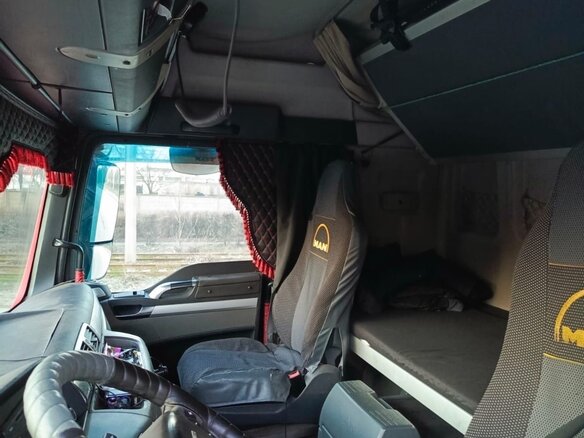 2011 MAN TGX, красный, 2350000 рублей - вид 3