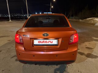2010 Kia Rio II Рестайлинг, оранжевый, 450000 рублей, вид 4