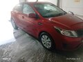 2012 Kia Rio 5-speed III, красный, 505000 рублей