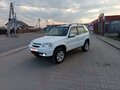 2013 Chevrolet Niva I Рестайлинг, белый, 600000 рублей - вид 1