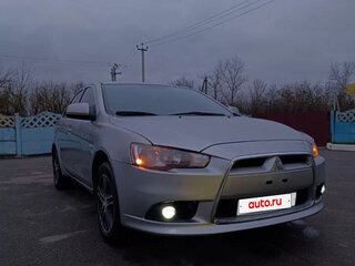 2012 Mitsubishi Lancer X Рестайлинг, серебристый, 750000 рублей, вид 1