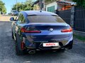 2022 BMW X4 30d II (G02) Рестайлинг, синий, 7100000 рублей - вид 4