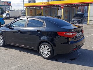 2014 Kia Rio III, чёрный, 665000 рублей, вид 4