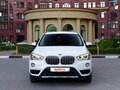 2015 BMW X1 20i xDrive II (F48), белый, 2140000 рублей - вид 1
