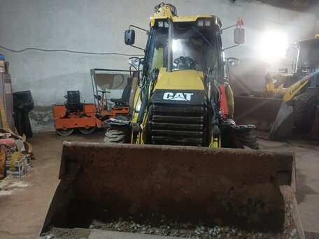 2014 Caterpillar 428, жёлтый, 5800000 рублей, вид 1