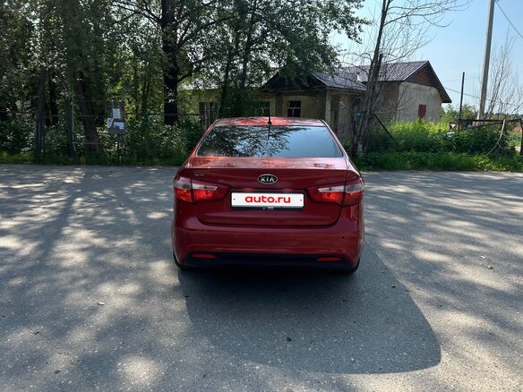 2012 Kia Rio 4-speed III, красный, 625000 рублей - вид 5