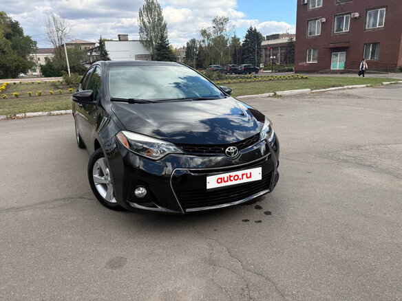 2014 Toyota Corolla XI (E160, E170, E180), чёрный, 1319000 рублей - вид 3